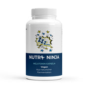 NUTRI NINJA Melatonin Kapseln, vegane Nahrungsergänzung aus natürlicher Fermentation, weiße Flasche mit blauem Etikett und Comic-Sprechblase mit 'Zzz';