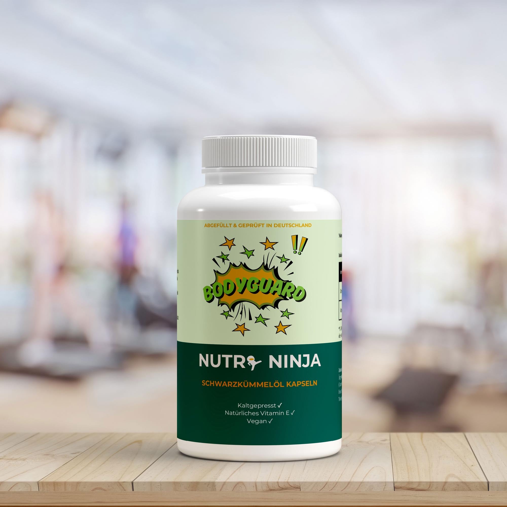 Weiße Flasche mit Kapseln, Nutri Ninja - Bodyguard, Schwarzkümmelöl Kapseln, vegan, kaltgepresst, mit natürlichem Vitamin E;