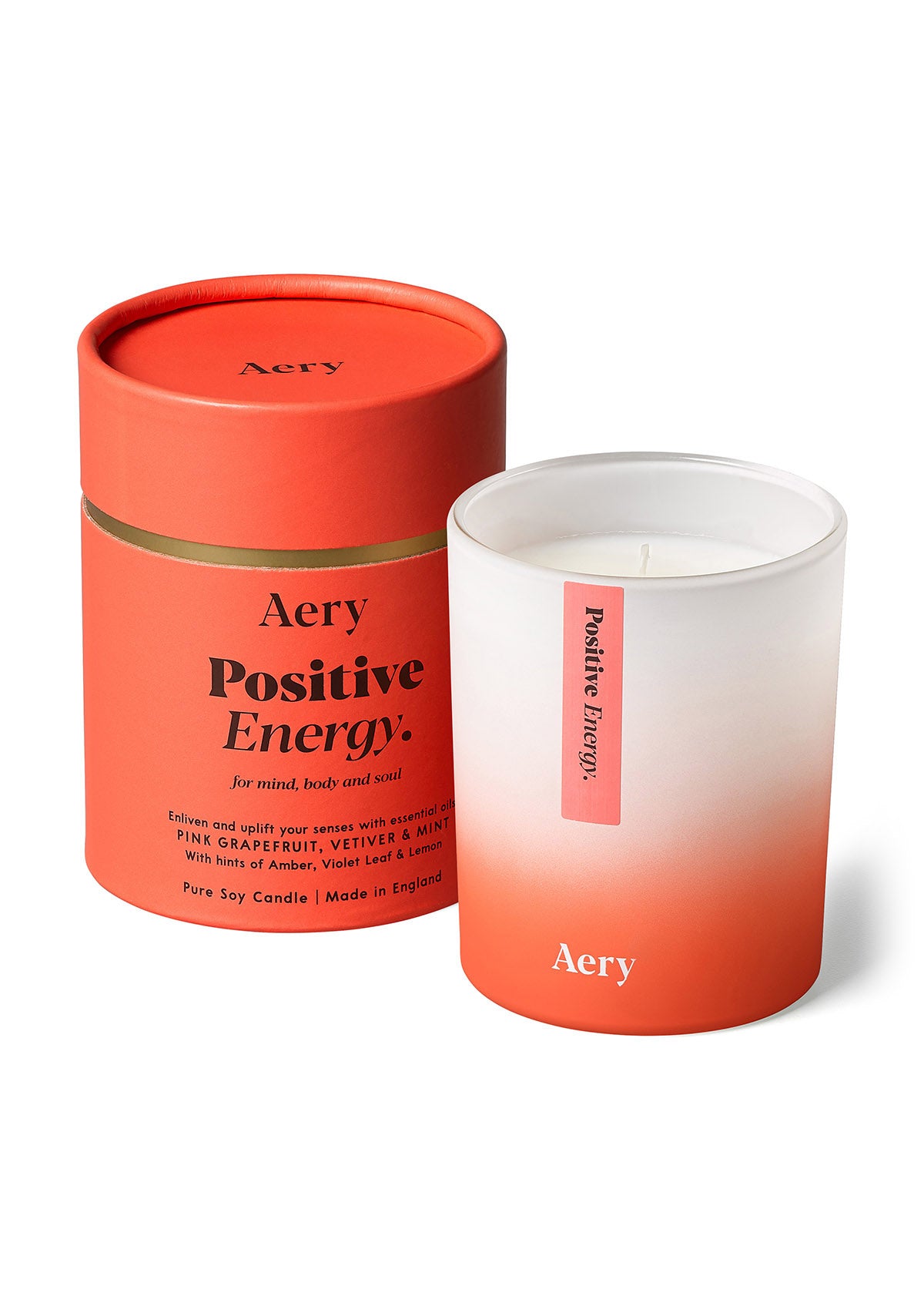 Aery Aromatherapie-Kerze 'Positive Energy' in weiß-orangem Glas mit passender runder Verpackung;