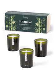 Aery Botanical Geschenkset mit drei grünen Kerzen in Glasbehältern und Verpackung mit Pflanzenillustrationen;