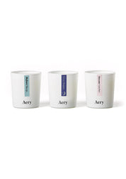 Drei weiße Aromatherapie-Kerzen von Aery mit den Düften 'Before Sleep', 'Sleep Happy' und 'Dream Catcher';