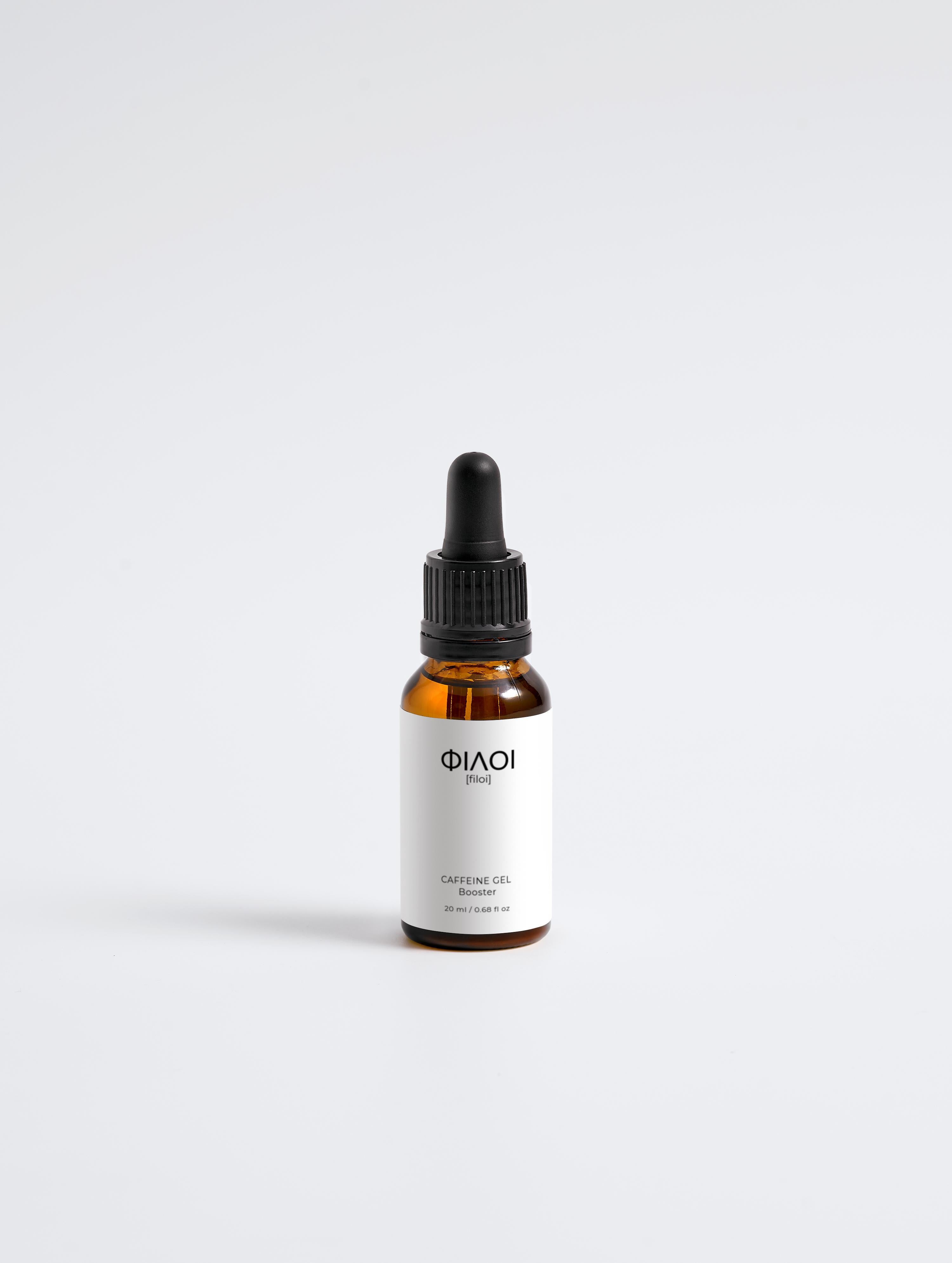Braune Glasflasche mit Pipette, beschriftet mit 'PILOI' und 'Coffeine Gel Booster';