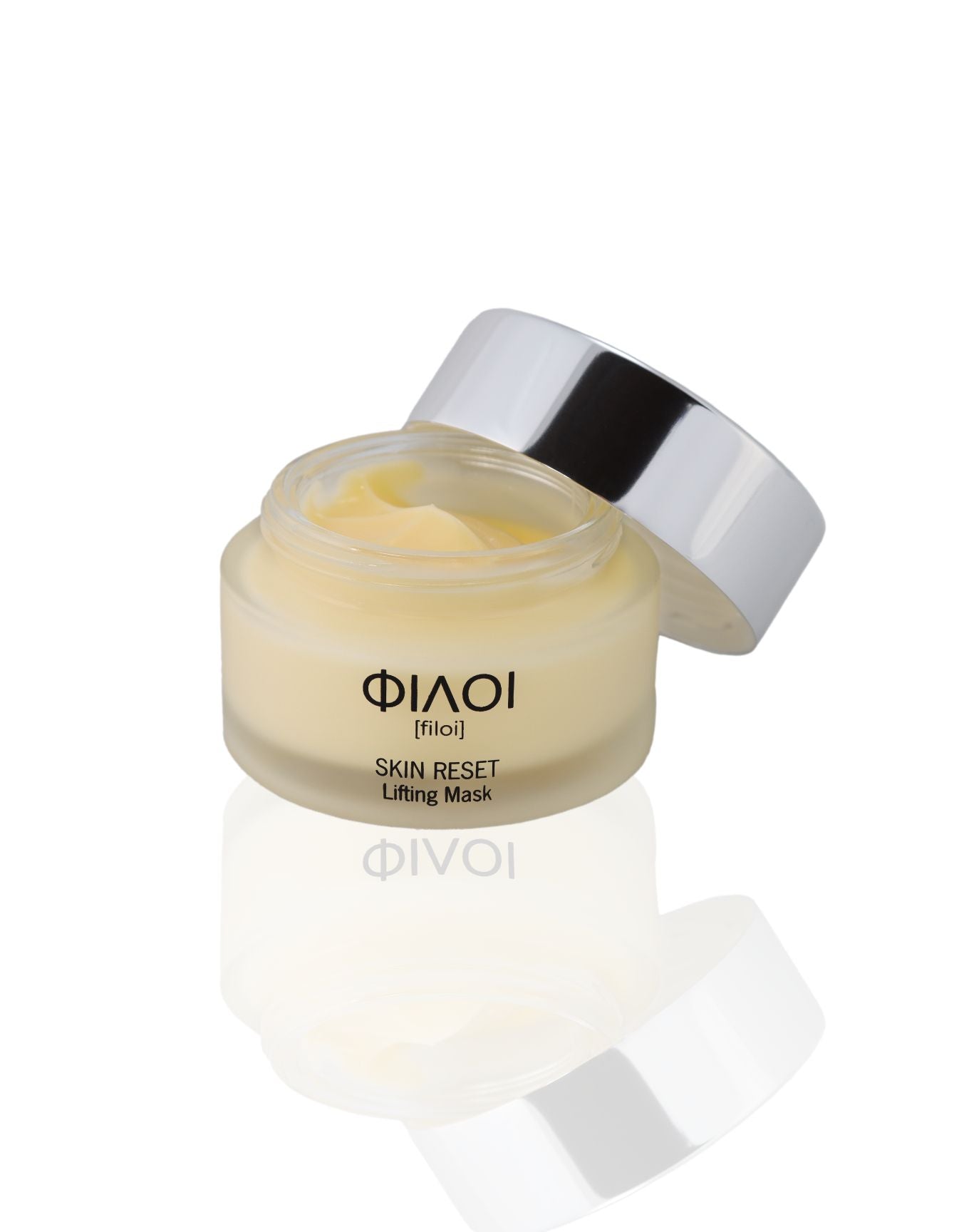 Geöffnete FILOI Skin Reset Lifting Maske in einem runden Glasbehälter mit silbernem Deckel;