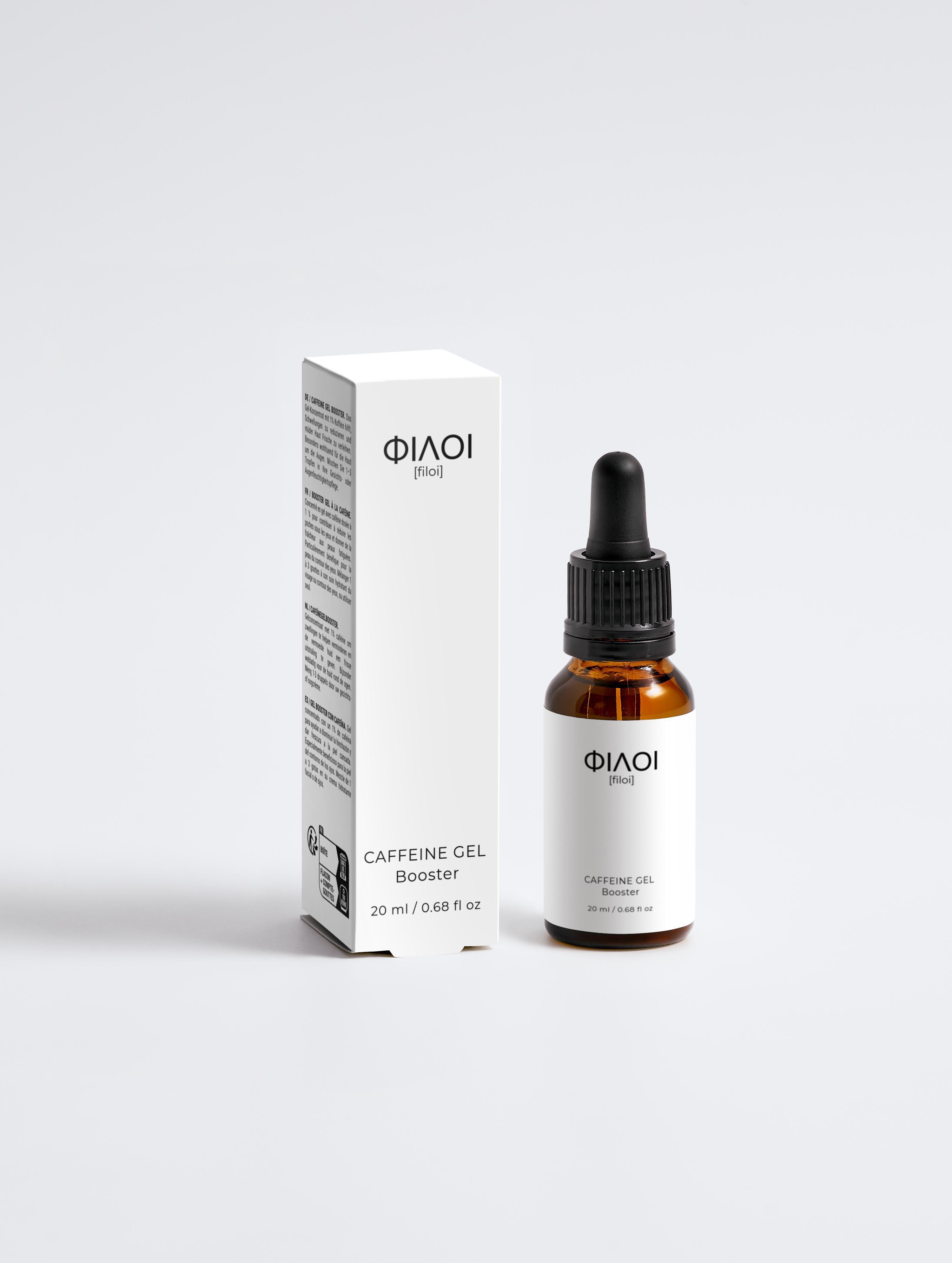 Braune Glasflasche mit Pipette und weißer Verpackung des Koffein-Gels 'ΦΙΛΟΙ [filoi]' mit 20 ml Inhalt;