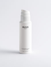Weißer Pumpspender mit der Aufschrift 'ΦΙΛΟΙ [filoi]' und 'Sunscreen LSF 30 für Gesicht und Körper, 150 ml';
